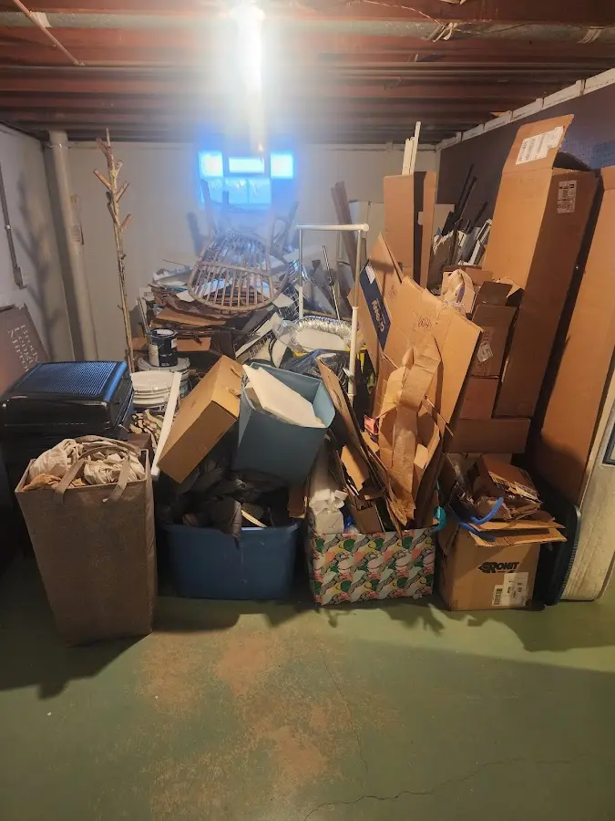 Roll-off dumpster container at job site for Yard Waste Dumpster Rental in Swartz